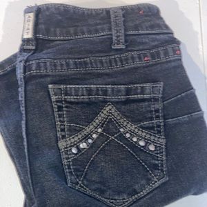 Ariat black slim boot flair jeans with back pocket detail and boot kick out